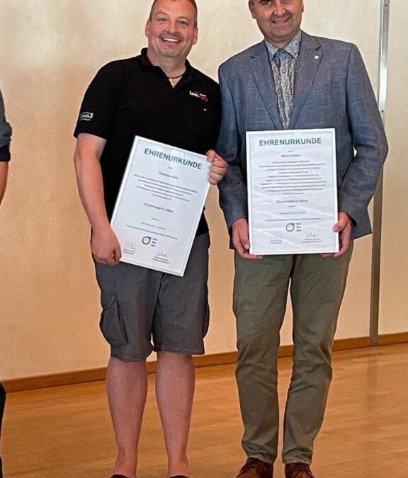 Ehrennadel in Silber auf Verbandsebene für Tom Herb und Alfred Keller